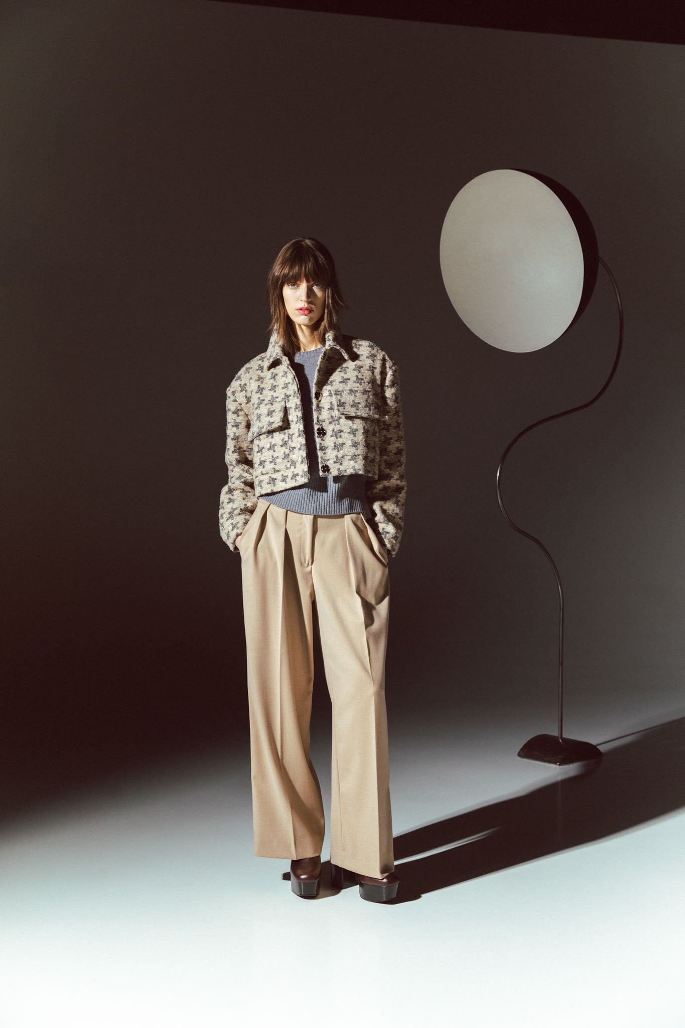 Pinstriped coat with striped finishes