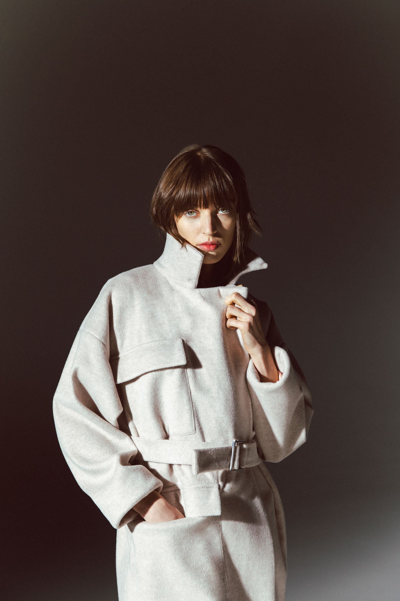 Pinstriped coat with striped finishes