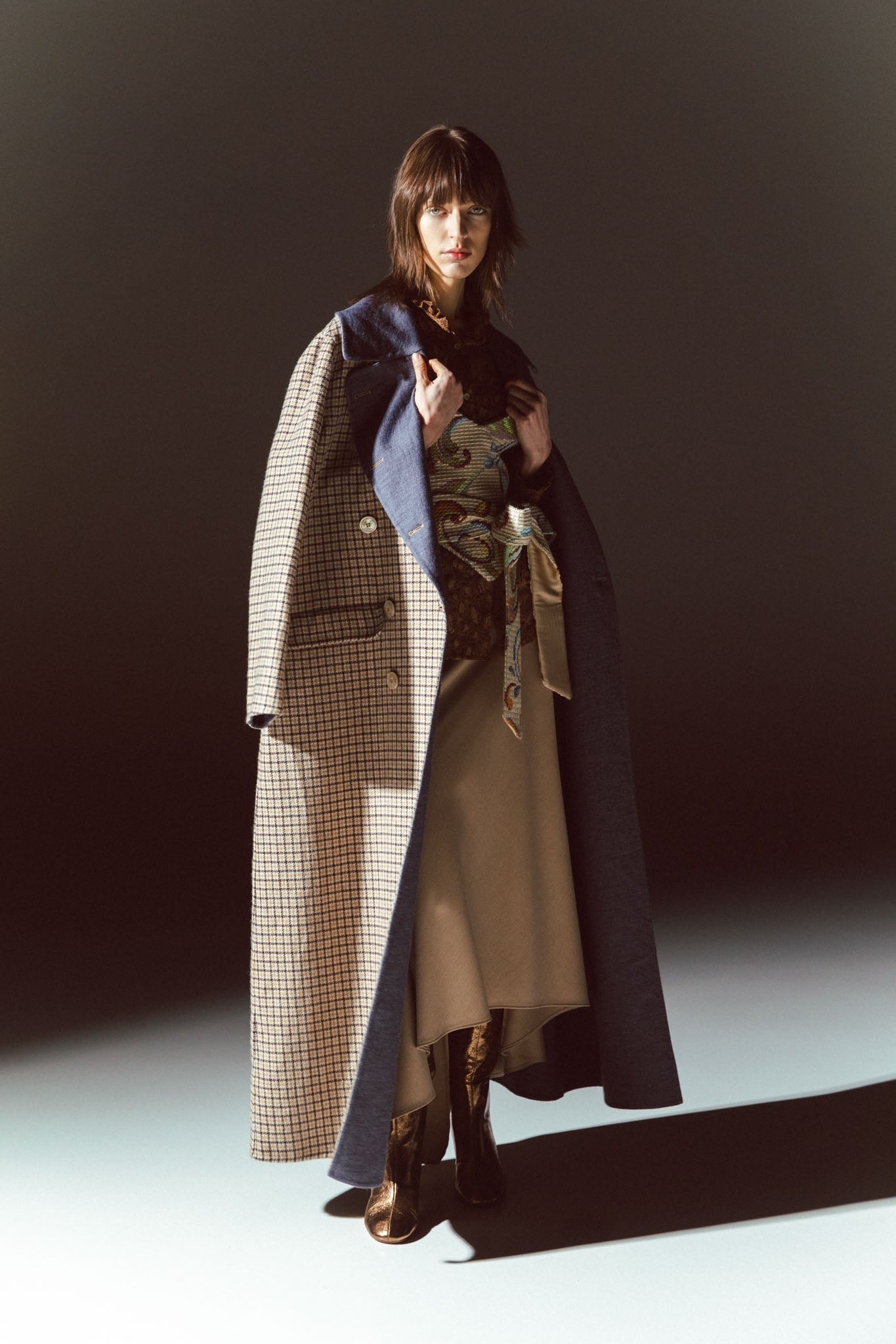 Pinstriped coat with striped finishes