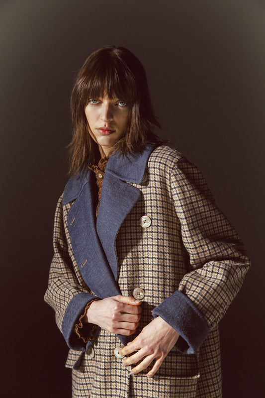 Pinstriped coat with striped finishes