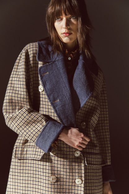 Pinstriped coat with striped finishes