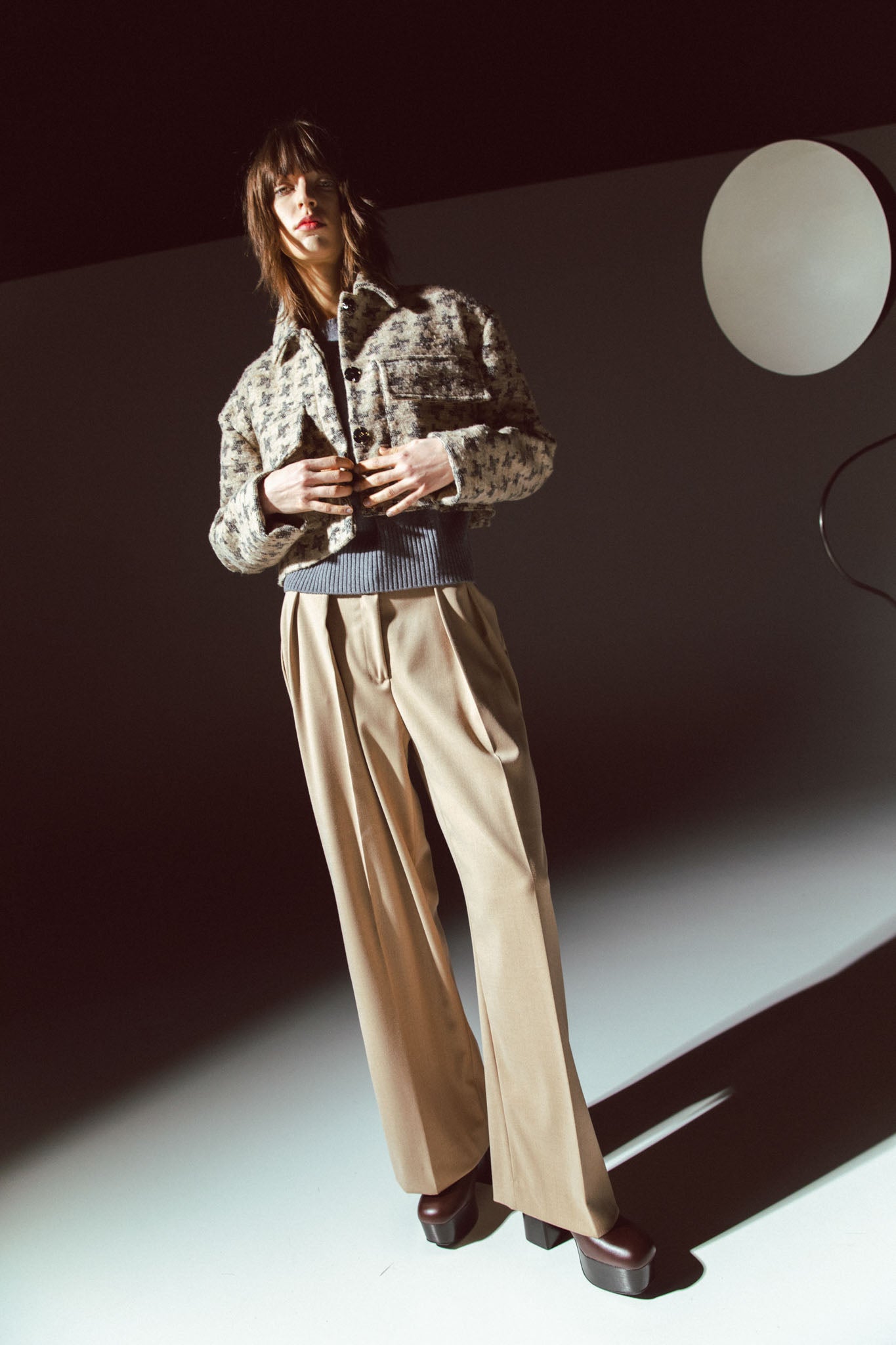Pinstriped coat with striped finishes
