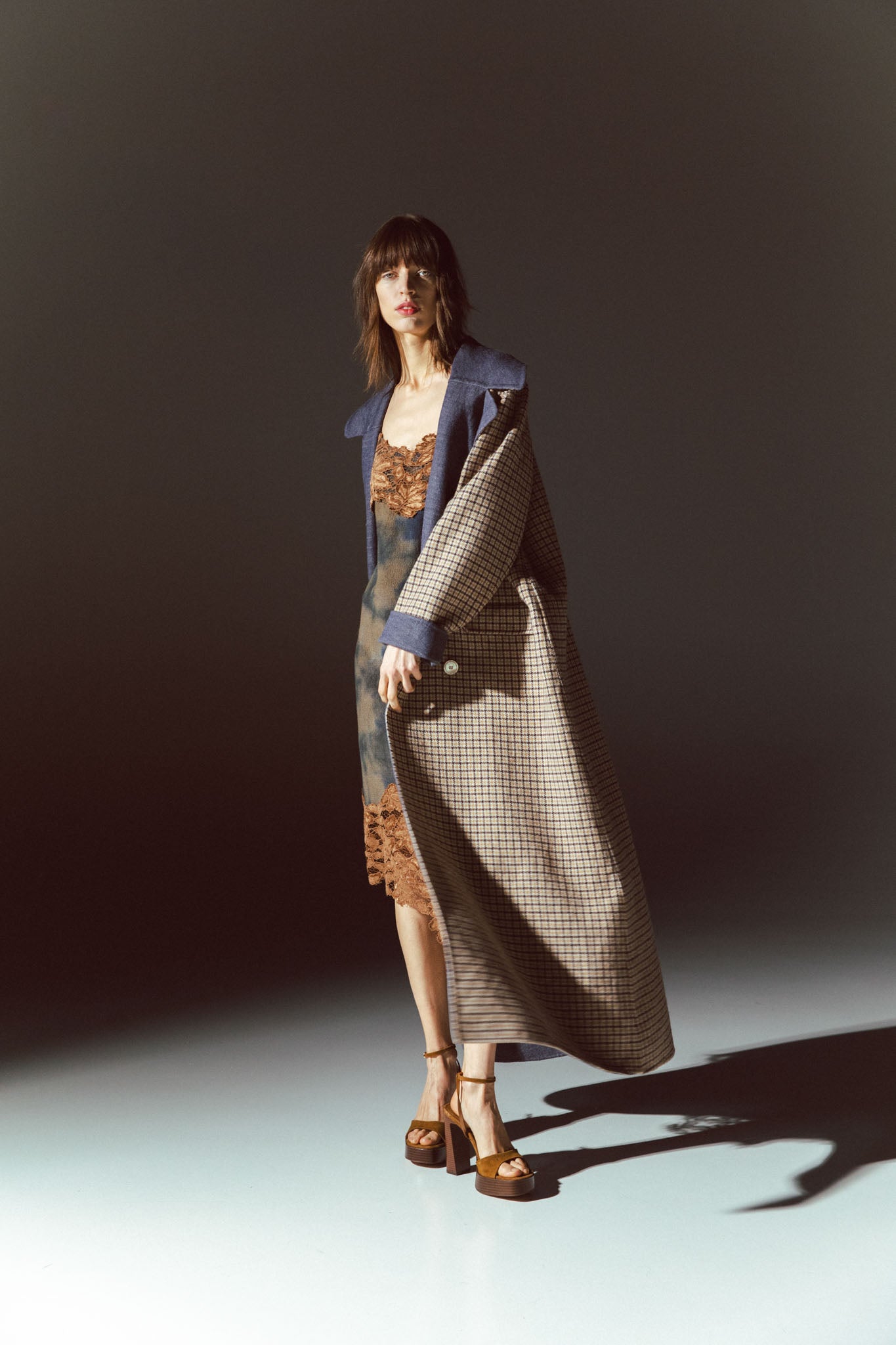 Pinstriped coat with striped finishes