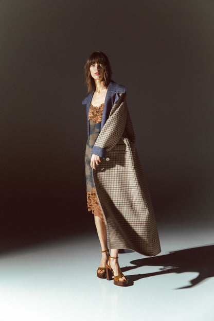 Pinstriped coat with striped finishes