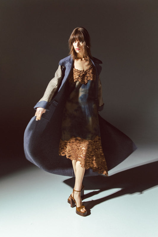 Pinstriped coat with striped finishes