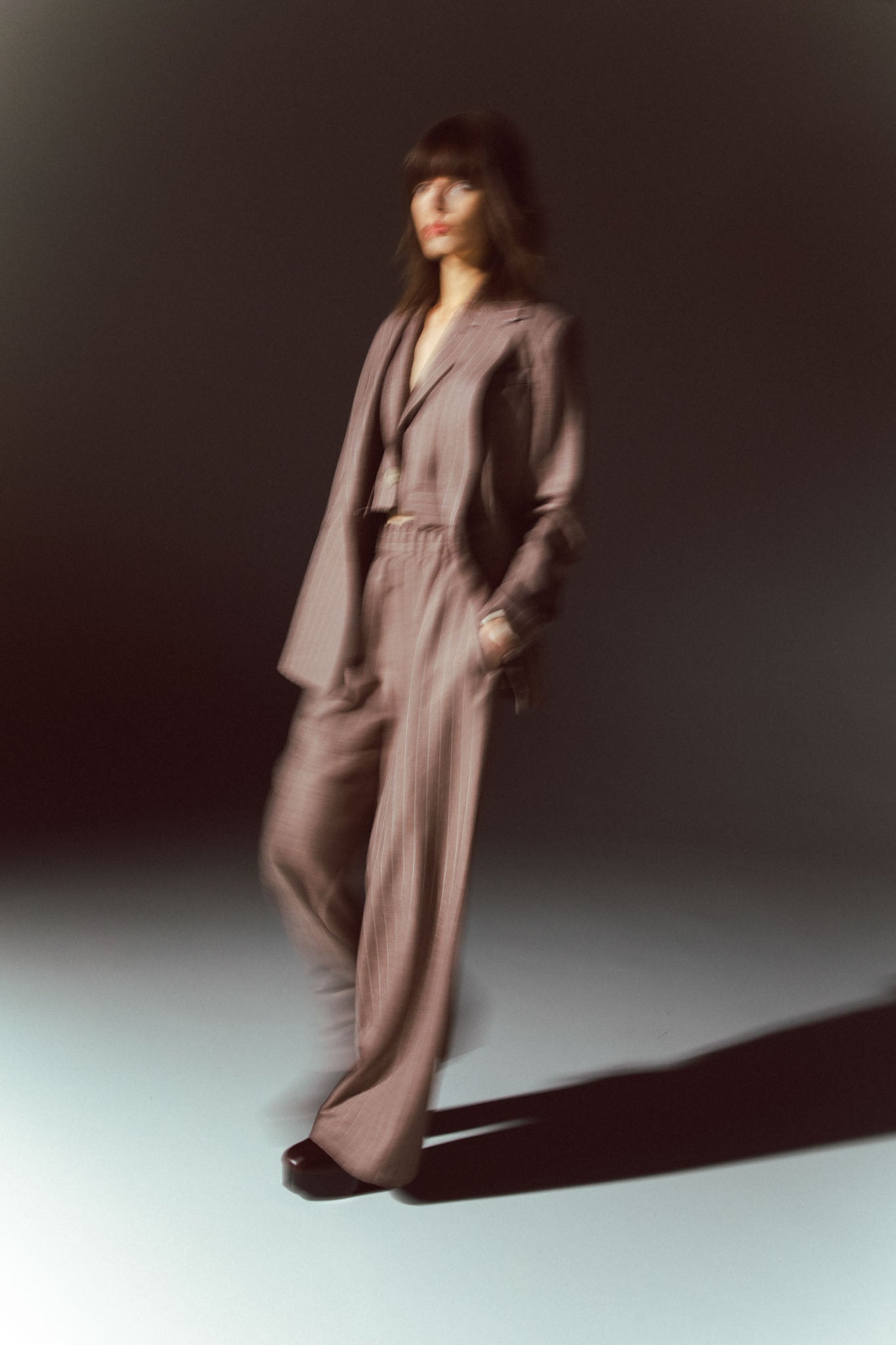 Pinstriped coat with striped finishes