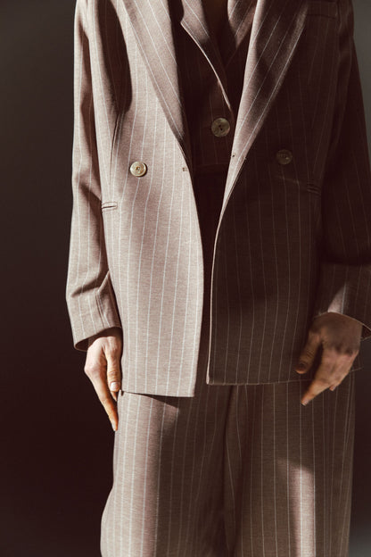 Pinstriped coat with striped finishes