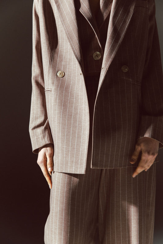 Pinstriped coat with striped finishes