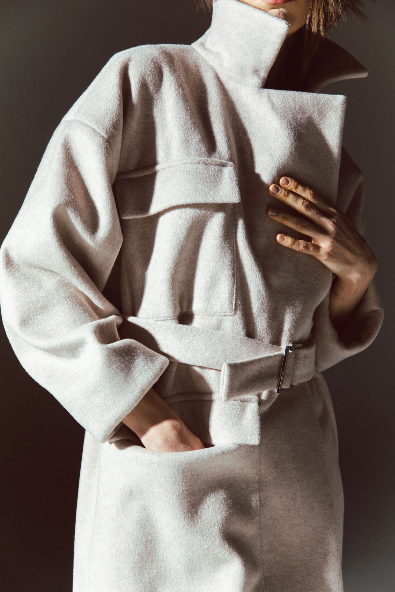 Pinstriped coat with striped finishes