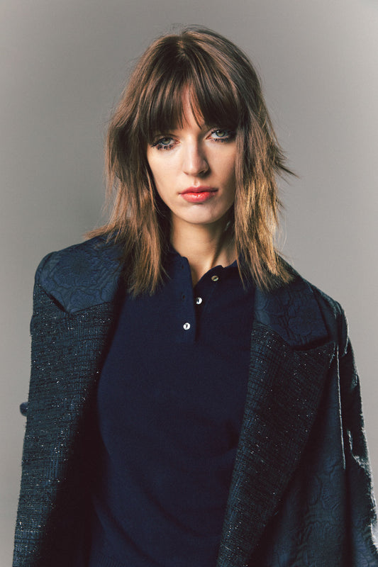 Pinstriped coat with striped finishes