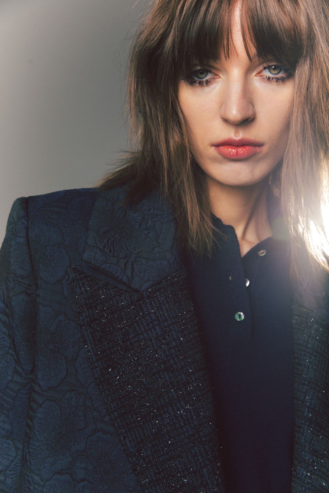 Pinstriped coat with striped finishes