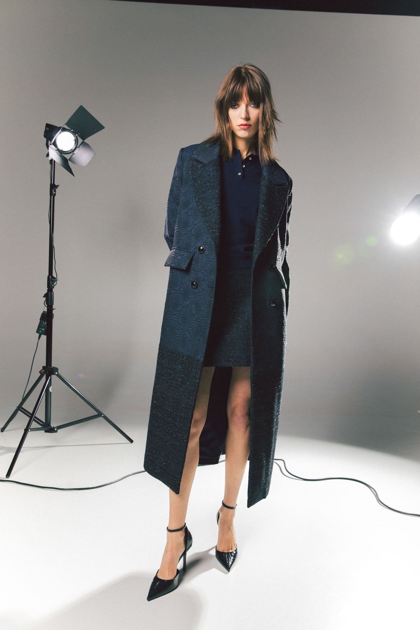 Pinstriped coat with striped finishes