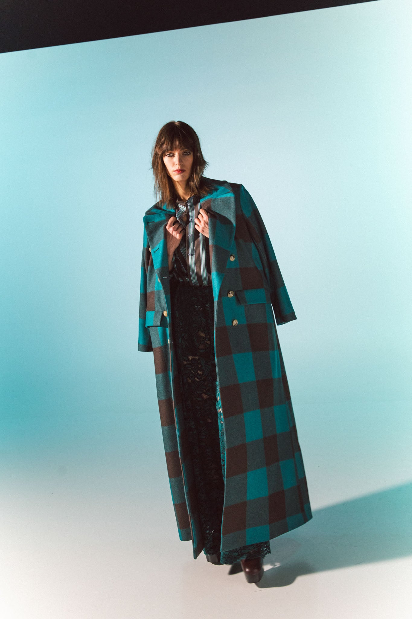Pinstriped coat with striped finishes