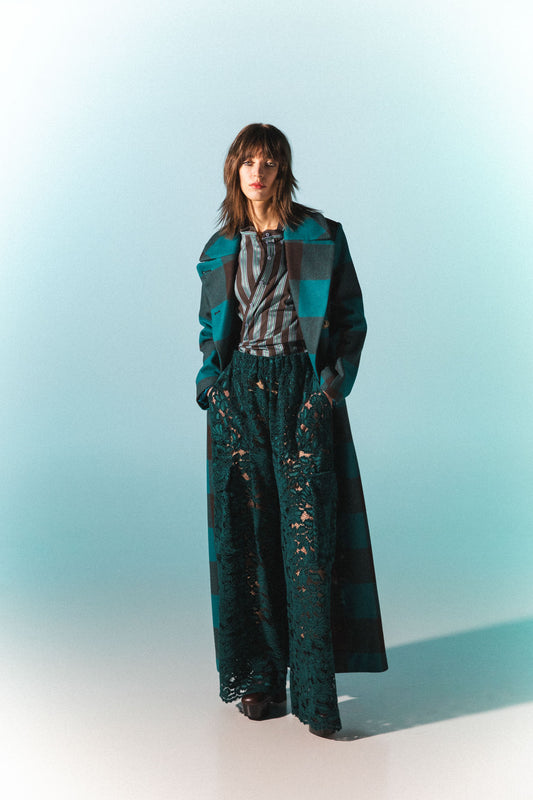 Pinstriped coat with striped finishes