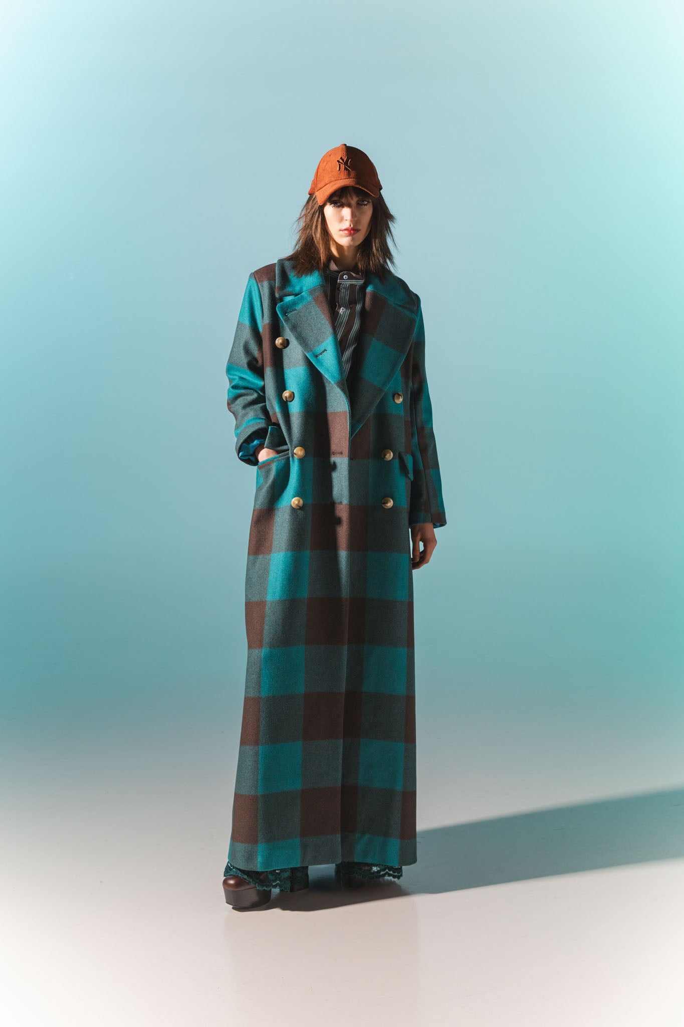 Pinstriped coat with striped finishes
